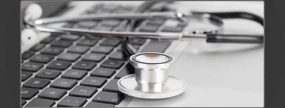 Image of a stethoscope on a laptop