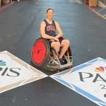 Woman in wheelchair competing in paralympics