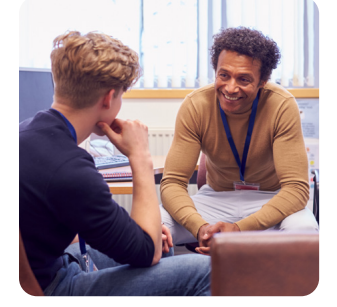 School counselor talking to a student